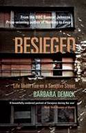 Cover image of book Besieged: Life Under Fire on a Sarajevo Street by Barbara Demick