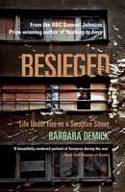 Cover image of book Besieged: Life Under Fire on a Sarajevo Street by Barbara Demick 