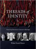 Cover image of book Threads of Identity: Preserving Palestinian Costume and Heritage by Widad Kawar